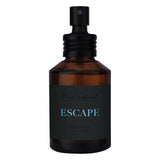 Pure Instinct Pheromone Eau De Parfum Escape 2 Oz bottle with dark amber glass and black label.