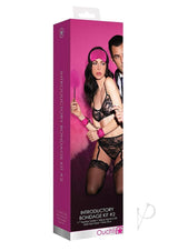 Ouch Introductory Bondage Kit No 2 4 Piece Pink packaging featuring soft cuffs and playful accessories.