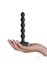 Petite Sensations Pearls Silicone Vibrating Anal Beads Black held in hand for scale.