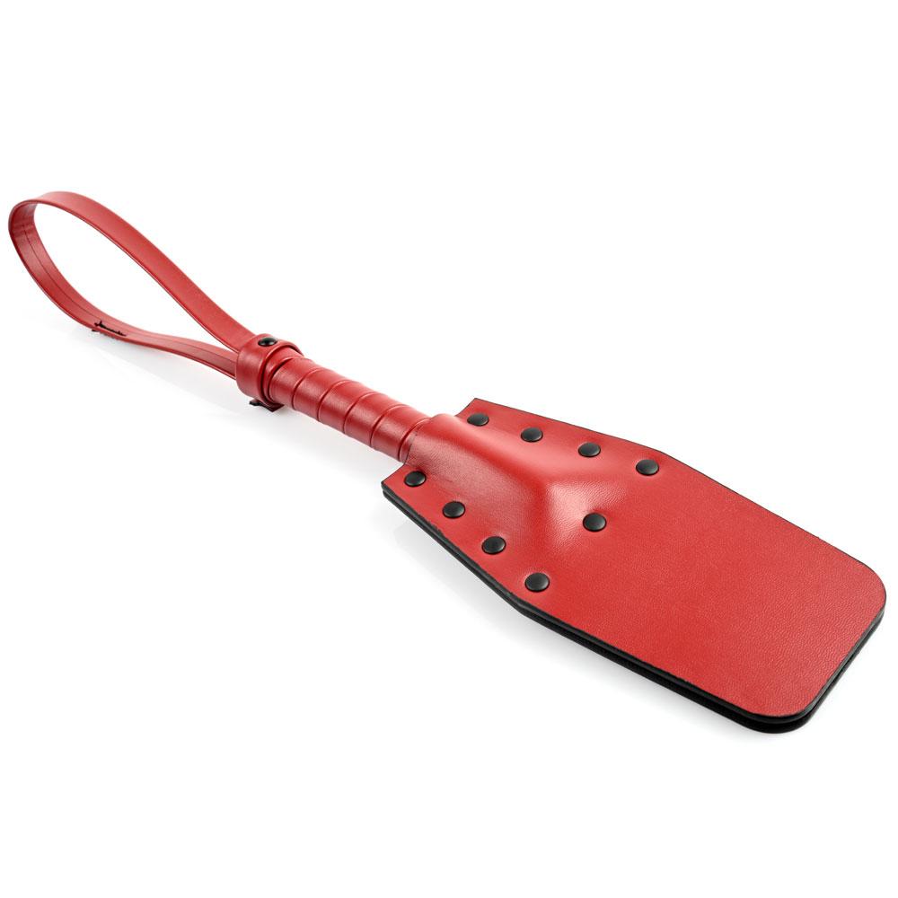 Sportsheets Saffron Studded Spanker in red, designed for sensation play and light discipline.