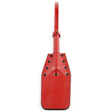 Sportsheets Saffron Studded Spanker in vibrant red, designed for impact play and sensation exploration.