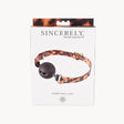 Sportsheets Amber Ball Gag Tortoiseshell Strap packaging showcasing stylish tortoiseshell design and comfortable ball gag.