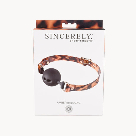 Sportsheets Amber Ball Gag Tortoiseshell Strap packaging showcasing stylish tortoiseshell design and comfortable ball gag.