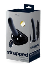 VeDO Strapped Vibrating Strap On Remote Just Black packaging featuring silicone strap-on with remote control.