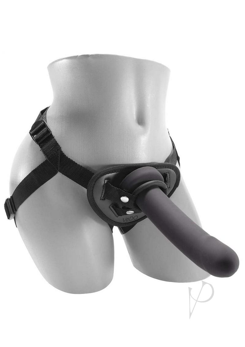 VeDO Strapped Vibrating Strap On Remote Just Black showcased on a mannequin with a harness.