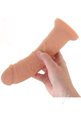 Colours Pleasures Girth Silicone Dildo 7 inch Vanilla held in a hand, showcasing its realistic design and soft texture.
