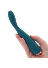 Luxe Lillie Silicone Slim Vibrator Teal held in hand showcasing its sleek design and flexible body.