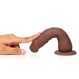 Easy Riders 7 Inch Realistic Silicone Dildo Dark with sculpted head and veiny shaft, being touched.