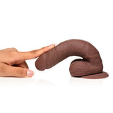 Easy Riders 7 Inch Silicone Dildo with Balls Dark being touched to showcase its realistic design and texture.