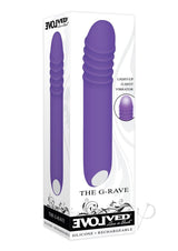 The G Rave Silicone G-Spot Light-Up Vibrator Purple in packaging, featuring ribbed design and light-up functionality.