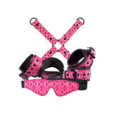 Sinful Neoprene-Lined Bondage Restraint Kit Pink, featuring elegant pink restraints and a sleek eye mask for BDSM play.