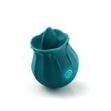 Inya The Kiss Dark Teal Clitoral Tongue Vibrator in the shape of a rosebud, designed for pleasure and clitoral stimulation.