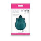 Inya The Kiss Dark Teal Clitoral Tongue Vibrator packaging showcasing its elegant rosebud design.