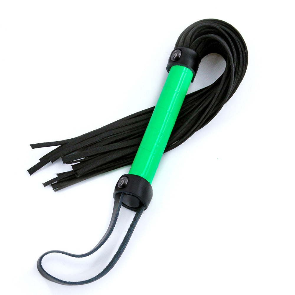 NS Novelties Electra Flogger Green with a vibrant handle and black tails for sensation play and bondage.