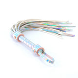 Cosmo Holographic Bondage Flogger Rainbow with shimmering falls and soft grip for sensual impact play.