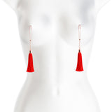 Bound Adjustable Nipple Clamps T1 Red on a mannequin, featuring tassels for an erotic experience.