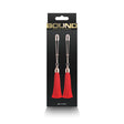 Bound Adjustable Nipple Clamps T1 Red in packaging featuring red tassels and silver clips for erotic play.