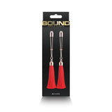 Bound Adjustable Nipple Clamps T1 Red in packaging featuring red tassels and silver clips for erotic play.