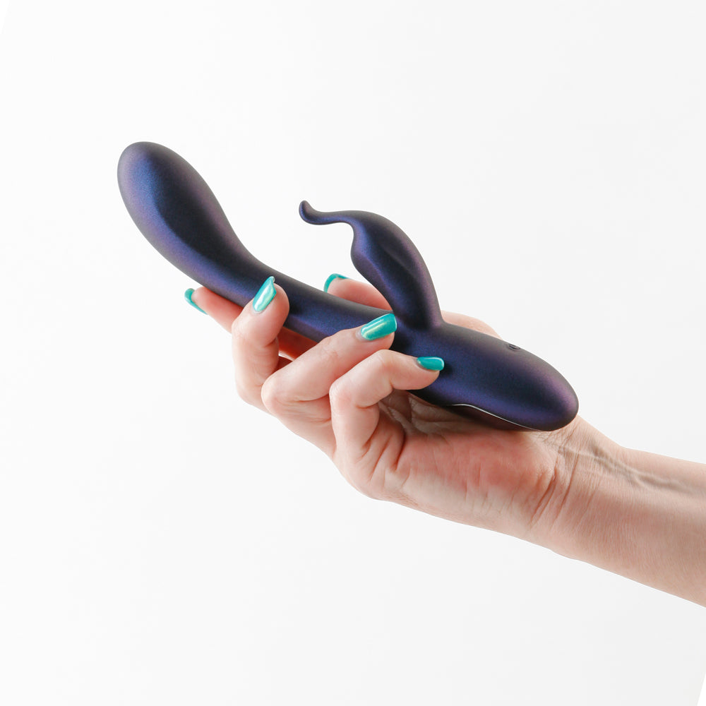 Royals Empress Metallic Blue Rabbit Vibrator held in a hand, showcasing its luxurious design and dual-action pleasure features.