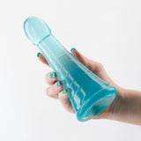 NS Novelties Fantasia Phoenix Suction Cup Dildo Teal held in hand, showcasing its vibrant teal color and design.