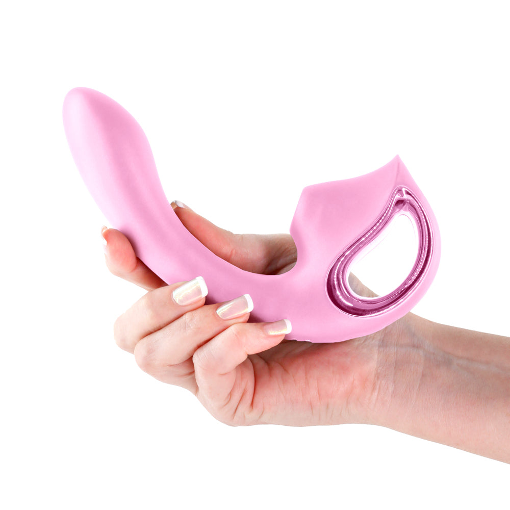 Seduction Kaia Air Pulse G-Spot Vibrator Metallic Pink held in a hand, showcasing its sleek design and dual stimulation features.