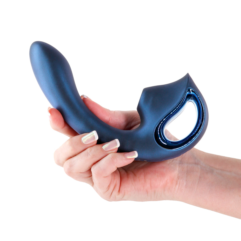Seduction Kaia Metallic Blue Air Pulse Vibrator held in a hand, showcasing its elegant design and dual-action features.
