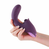 INYA Caprice Thrusting G-Spot Vibrator Purple held in a hand showcasing its elegant design and rich color.
