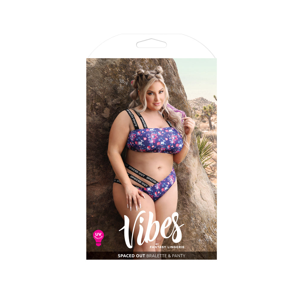 Spaced Out Bralette & Panty Queen Size packaging featuring a model in a floral UV reactive set.