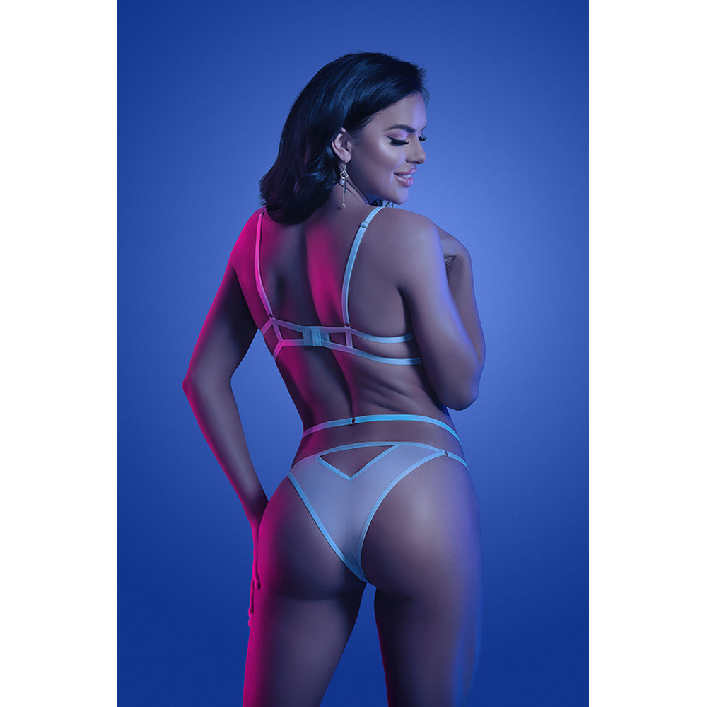 Model showcasing Fantasy Lingerie Prismatic Glow Bra and Panty M L against a vibrant blue background.
