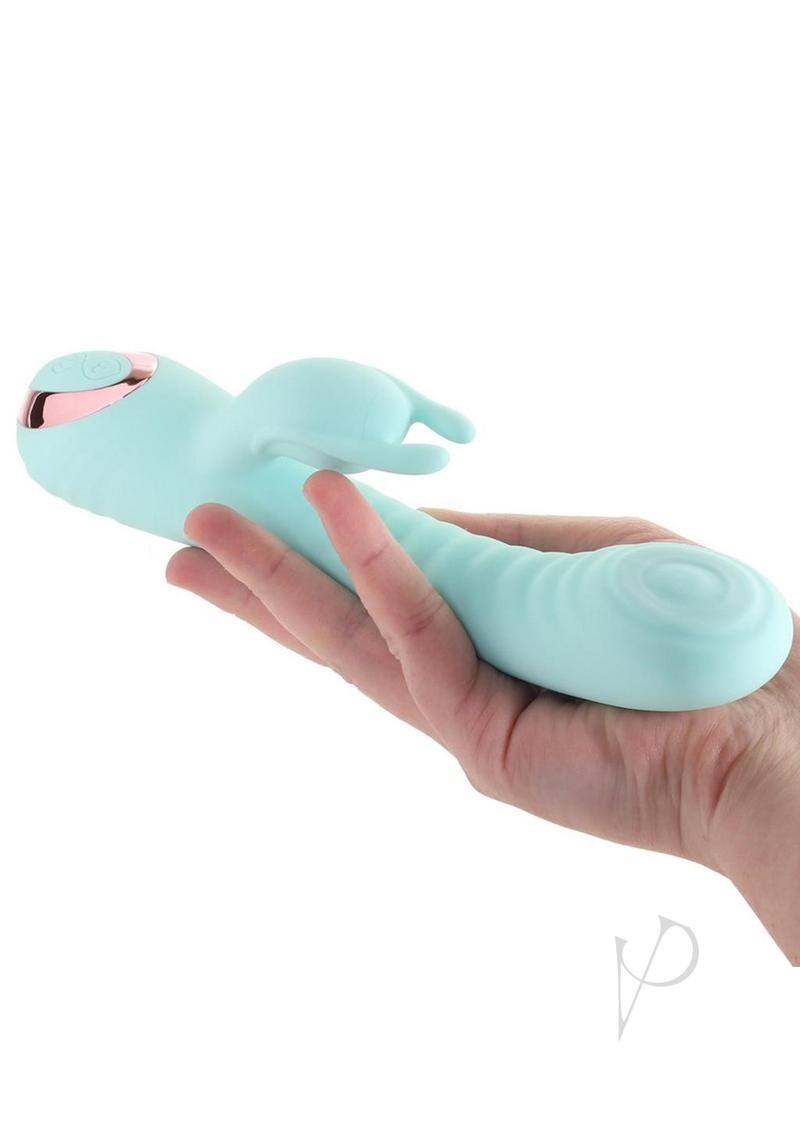 Exciter Thumping G-Spot Rechargeable Rabbit Vibrator Aqua held in a hand, showcasing its sleek design.