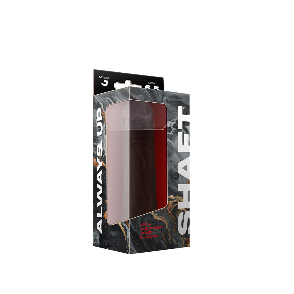 Shaft Model J 6.5 inch Liquid Silicone Dong Mahogany packaging displayed with artistic design.
