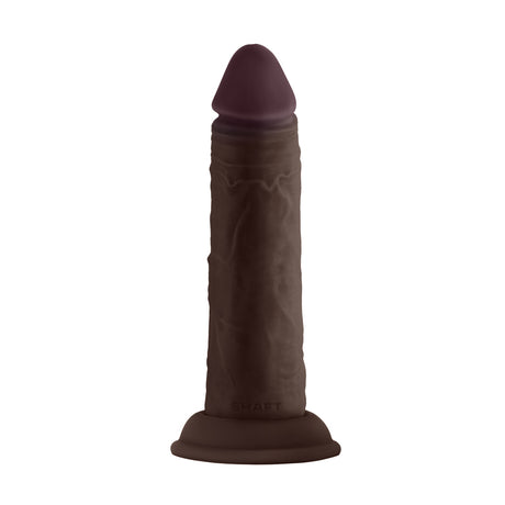 Shaft Model J 5.5 inch Liquid Silicone Dong Mahogany on a white background, showcasing its realistic design and texture.