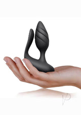 Cocktail Couples Vibrator with Remote Black Rose Gold in a hand, showcasing its sleek design and dual-motor functionality.