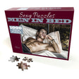 Little Genie Sexy Puzzle Chase 1000 Piece Puzzle box featuring a handsome man in bed.