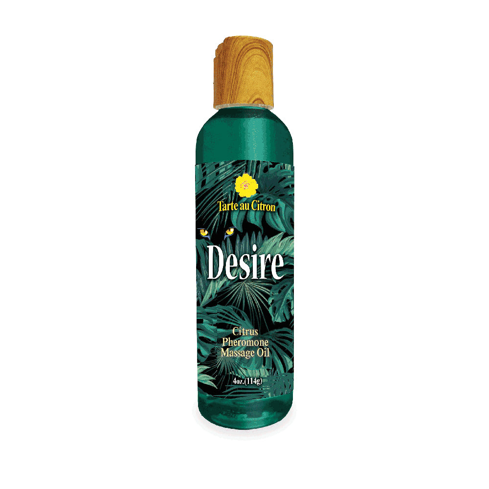 Desire Pheromone Massage Oil Citrus 4 Oz bottle with tropical leaves design for intimate relaxation.