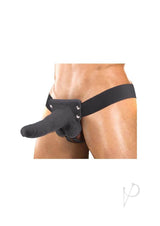 Erection Assistant Hollow Vibrating Strap-On 6 inch Black worn on a model, showcasing versatile harness design.