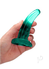 RealRock Crystal Clear Dildo with Suction Cup 5 inch held in a hand, showcasing its sleek design and transparency.