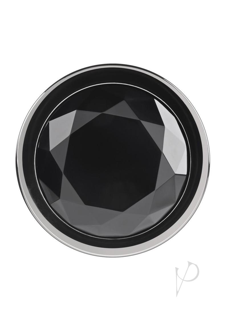 Close-up of the black gem of the Gender X Black Pearl Aluminum Anal Plug Smoke, featuring a faceted design.