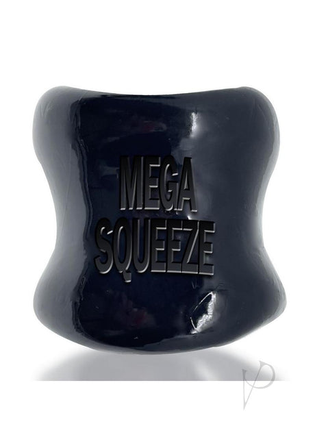 Oxballs Mega Squeeze Ergofit Ballstretcher Black showcasing its ergonomic design and bold text.