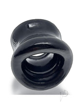 Oxballs Mega Squeeze Ergofit Ballstretcher Black close-up view showing its ergonomic design and smooth finish.