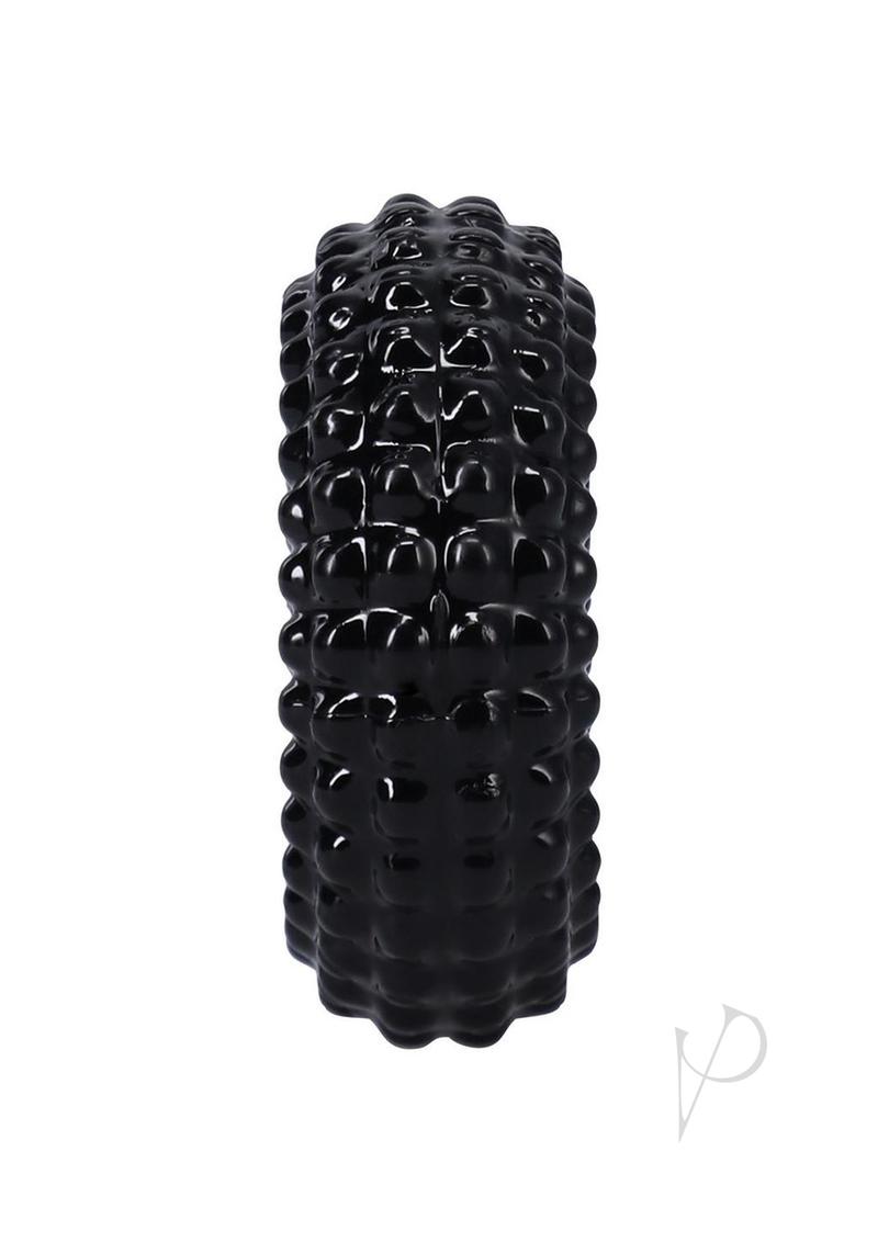 Rock Solid The Radial Cock Ring Black features intricate tread-style texture for enhanced sensation.