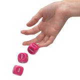 Utopia Naughty Party Dice being rolled with playful actions like kiss, neck, and shower on colorful dice.