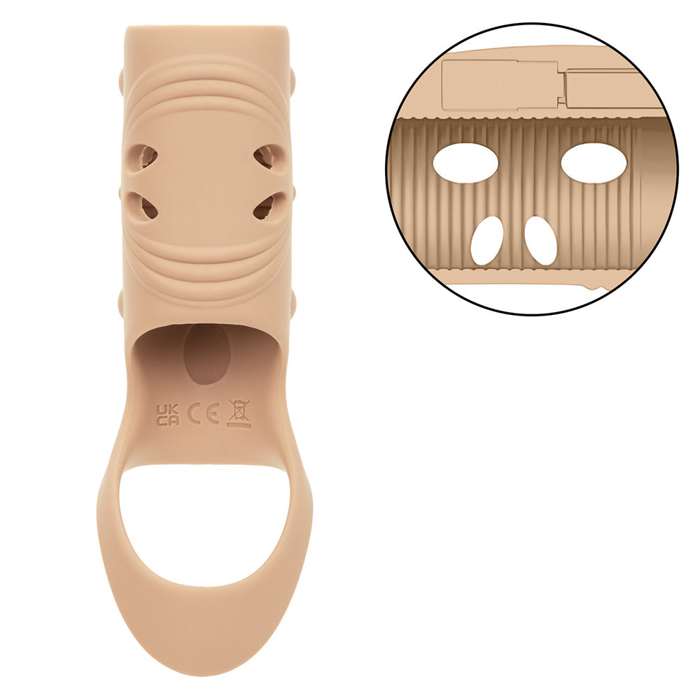 Performance Maxx Rechargeable Penis Sleeve Ivory showing the ridged texture and open head design for enhanced pleasure.