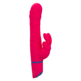 Love Bunny Beaded Spin Bunny Vibrator in vibrant pink with textured shaft and bunny ears for dual stimulation.