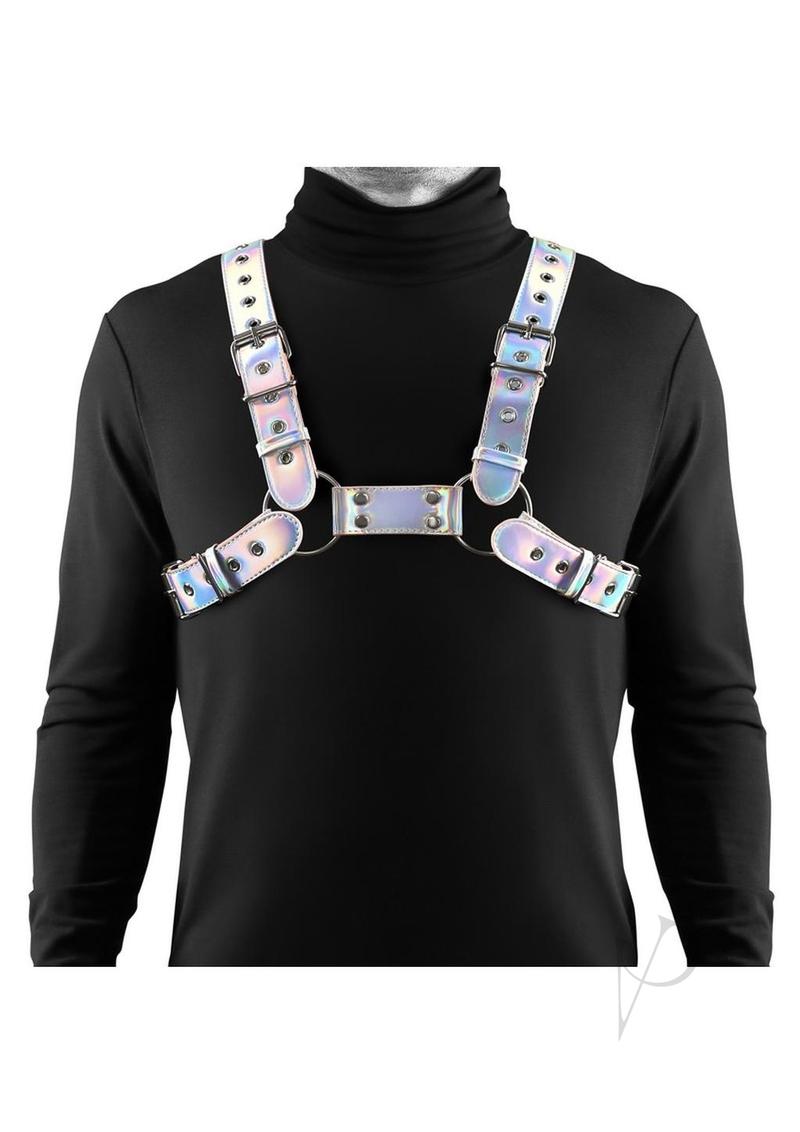 Cosmo Harness Rogue Chest Harness Small/Medium Rainbow worn over a black turtleneck, showcasing its striking design.