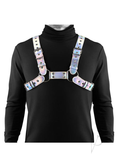 Cosmo Harness Rogue Chest Harness Small/Medium Rainbow worn over a black turtleneck, showcasing its striking design.