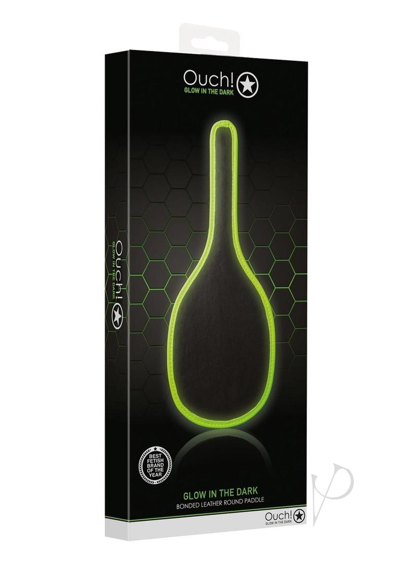 Ouch Round Paddle Glow in the Dark Green packaging featuring a striking fluorescent design and bold impact play style.