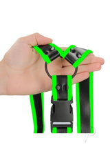 Ouch Buckle Harness Glow in the Dark Large XLarge Green held in hand showing black and fluorescent green design.