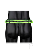 Ouch Buckle Jock Strap Metal Glow in the Dark Green on a mannequin, showcasing its luminous design and bondage aesthetic.