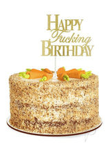 Happy F'ing Birthday Cake Topper Gold Black on a decorated birthday cake with carrot accents.